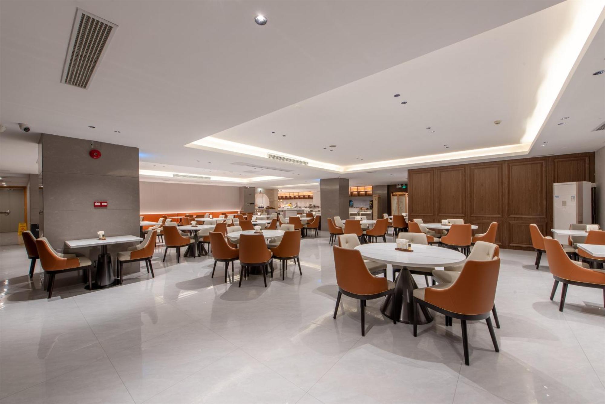 Vienna International Hotel Guangzhou Baiyun International Conference Center Экстерьер фото